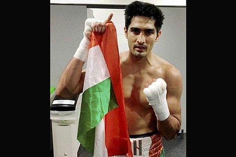 Indian star Vijender Singh defeated Zulpikar Maimaitiali