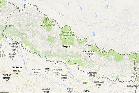 The Koshi river in the south of the country, a main waterway, was above the danger level