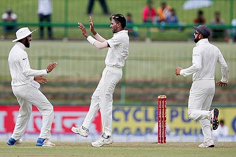 India's Hardik Pandya celebrates after taking a wicket