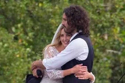 Russell Brand and Laura Gallacher
