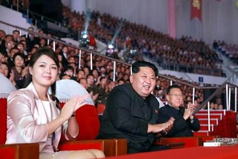 File photo of North Korea leader Kim Jong-Un with his wife