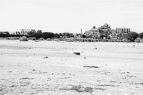 Picture shows a dry bed of Cauvery
