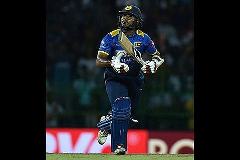 Sri Lanka's Dilshan Munaweera plays a shot against India during a T20 match