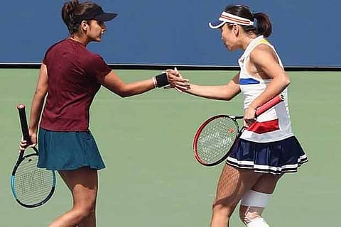 Sania Mirza and Shuai Peng celebrate their victory in the quarter-final of the US Open