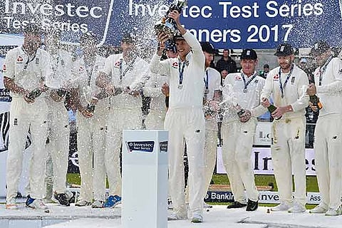 England captain Joe Root poses with the trophy after the win over West Indies
