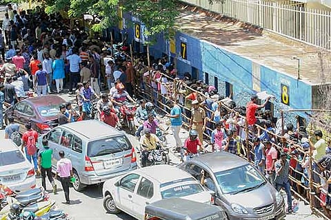 Cricket fans make a beeline to acquire tickets for the India-Australia ODI