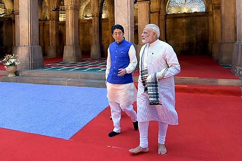 PM Narendra Modi and Japanese PM Shinzo Abe during a visit to the Sidi Saiyyed Mosque