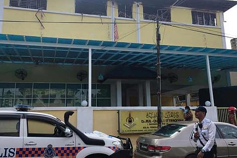 Police and fire department work at the religious school Darul Quran Ittifaqiyah