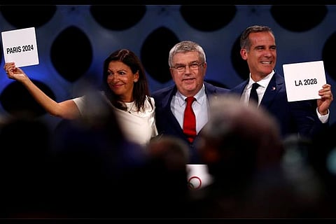 President Thomas Bach next to Mayor of Paris Anne Hidalgo and Mayor of Los Angeles Eric Garcetti