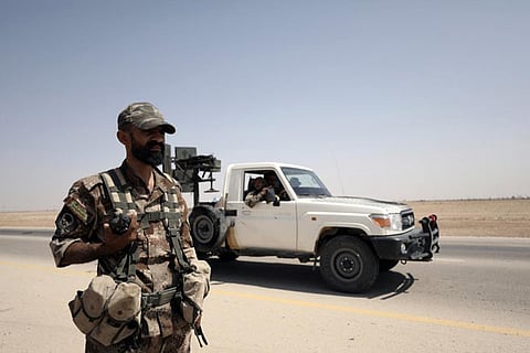 A fighter of Syrian Democratic Forces (SDF) is seen in the eastern Deir al Zor, Syria
