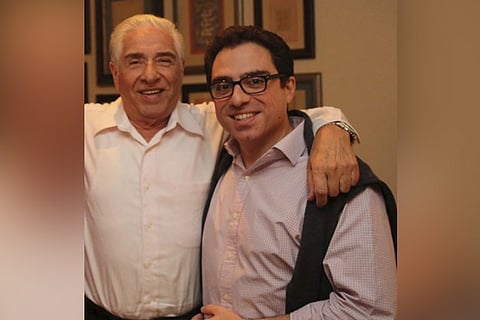 Siamak Namazi (R) is pictured with his father Baquer Namazi in this undated family handout picture