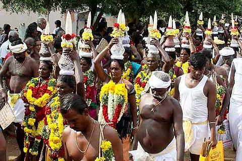 Women carrying Madhu Kalayam on the final day of Ezhai Katha Amman Temple fest (Photo: Imthiyas Ali)
