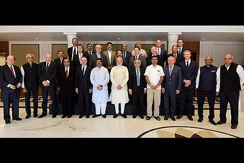 Prime Min Modi in a group photograph with the Oil and Gas CEOs and Experts from across the world