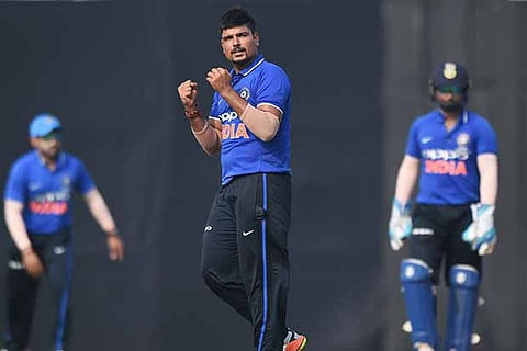 Karn Sharma celebrates after dismissing Kane Williamson