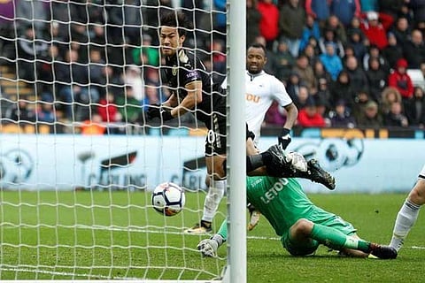 Leicester City's Shinji Okazaki scores their second goal