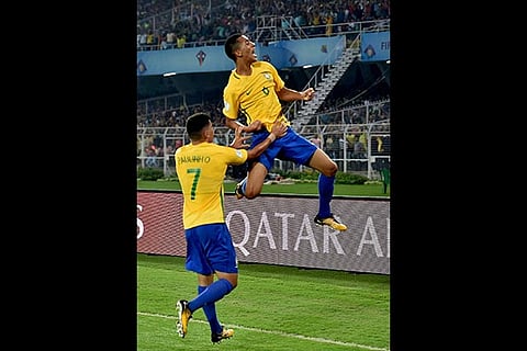 Brazilian defender Weverson(6) jubilates with a teammate