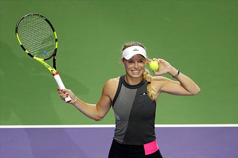 Caroline Wozniacki celebrates winning her semi-final match against Karolina Pliskova