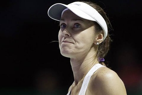 Martina Hingis ended her career on a losing note as she and her partner Chan Yung-jan lost
