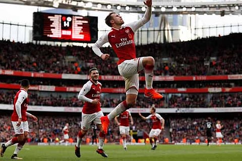 Arsenal's Aaron Ramsey celebrates scoring their second goal