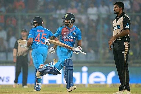 Openers' record stand powers India to 202/3