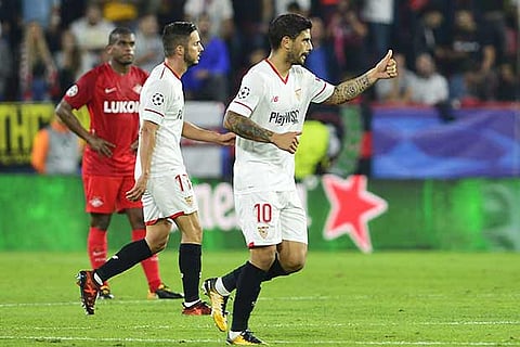 Ever Banega (right) reacts after scoring the winner
