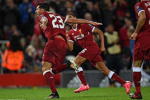 Emre Can (left) celebrates after scoring in a 3-0 rout at Anfield against Maribor