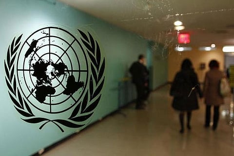 The United Nations logo is displayed on a door at UN headquarters in New York
