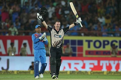 Colin Munro celebrates his hundred during the 2nd T20I match between India and New Zealand