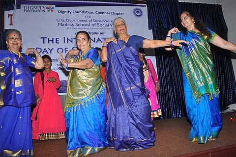 Residents of a retirement home seen at a dance event conducted exclusively for them