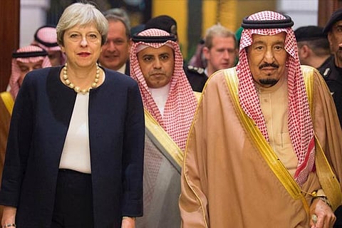 Saudi Arabia's King Salman bin Abdulaziz Al Saud with Britain's Prime Minister Theresa May