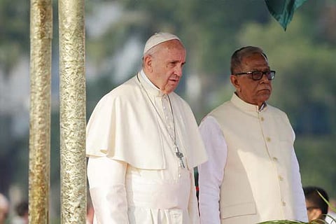 Pope Francis attends a welcome ceremony with Bangladesh's President Abdul Hamid in Dhaka