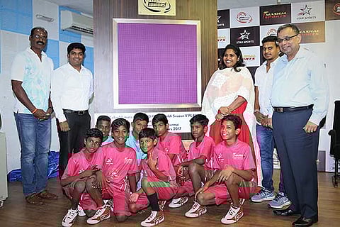 ?KBD Juniors? finslist Jeppiar school members receive kabaddi mats during a function