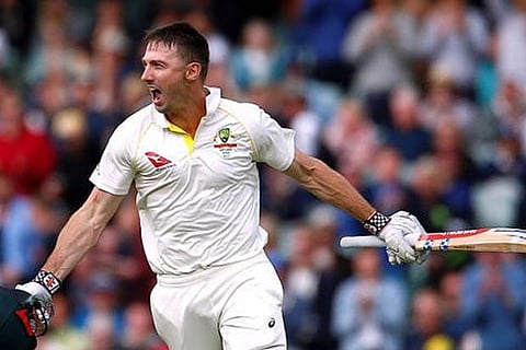 Shaun Marsh celebrates after reaching his century during the second Ashes cricket match