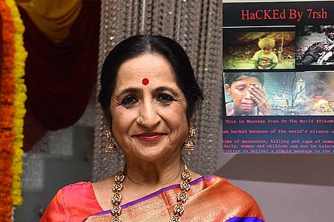Aruna Sairam and a snapshot of the website that was hacked which has now been restored