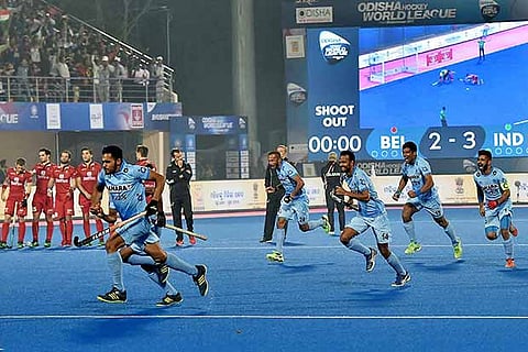 Indian players celebrate after their win against Belgium in penalty shoot out during Men's HWL Final