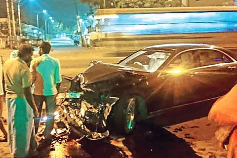 The mangled remains of the car