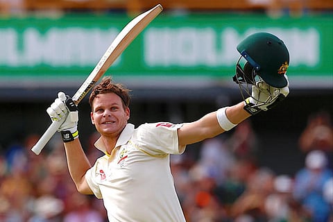 Australia's captain Steve Smith celebrates reaching his double century