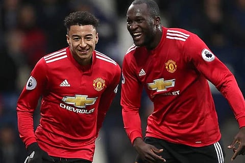 Jesse Lingard and Romelu Lukaku celebrate the latter's opener for Manchester United