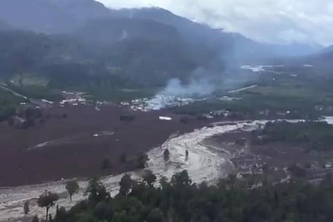 Damage done by a landslide is seen in Villa Santa Lucia, Los Lagos, Chile