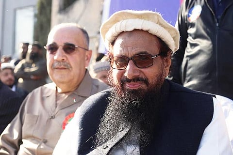 Walid Abu Ali, Palestine ambassador to Pakistan (L) alongside JuD chief Hafiz Saeed