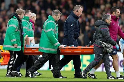 Manchester City's Kevin De Bruyne is stretchered off after sustaining an injury