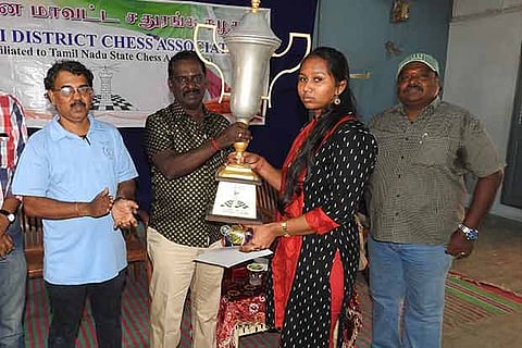 Sandhya receiving her award