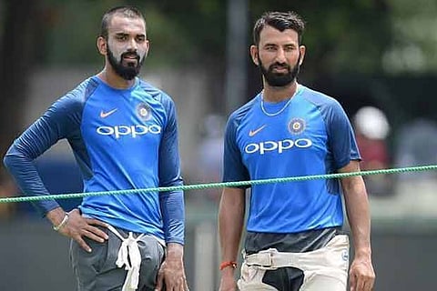 Cheteshwar Pujara and KL Rahul during a practice session
