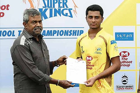 S Ganesh (right) receives the ?Man of the Match? award