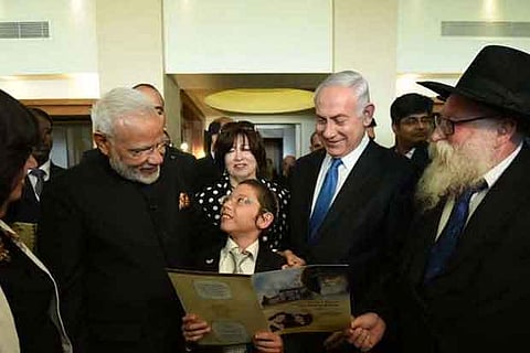 PM Narendra Modi meets Moshe Holtzberg, the boy who survived 26/11 Mumbai attack in 2008.File photo