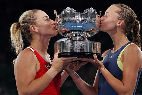 Hungary's Timea Babos and France's Kristina Mladenovic celebrate winning the Women's Doubles Final