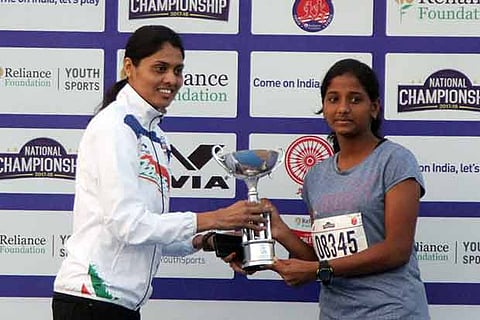 P Shivani (right) of Vanavani Matric Higher Secondary School, Chennai, receives award