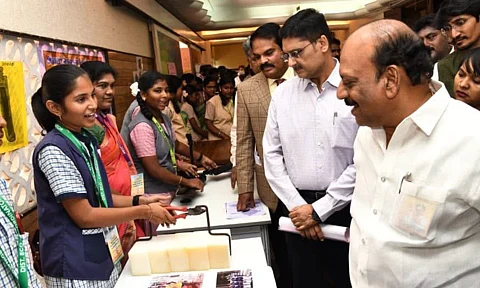 The minister with students