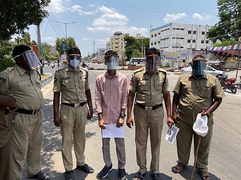 Distributing face shields to the police | (Pic: P Mohan Aditya)