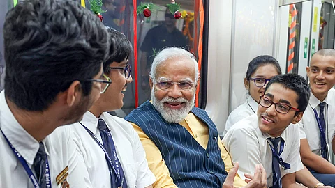 PM Modi rides India’s first underwater metro with school children